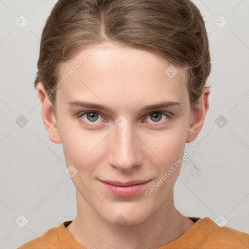 Joyful white young-adult female with short  brown hair and grey eyes