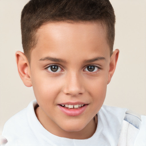 Joyful white child female with short  brown hair and brown eyes