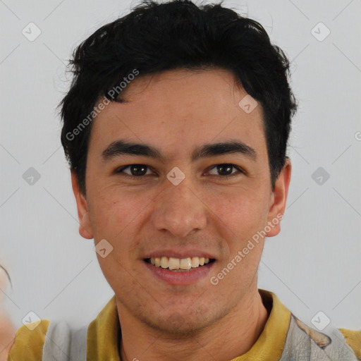 Joyful white young-adult male with short  black hair and brown eyes