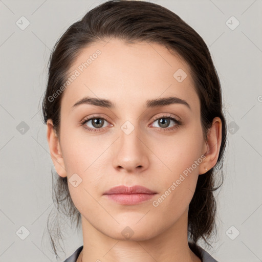 Neutral white young-adult female with medium  brown hair and brown eyes