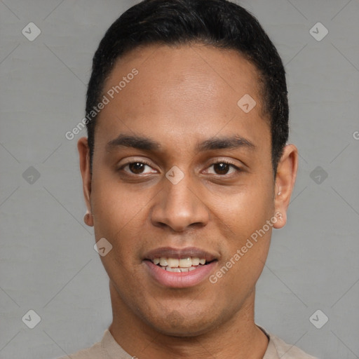 Joyful latino young-adult male with short  black hair and brown eyes