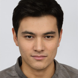 Neutral asian young-adult male with short  brown hair and brown eyes