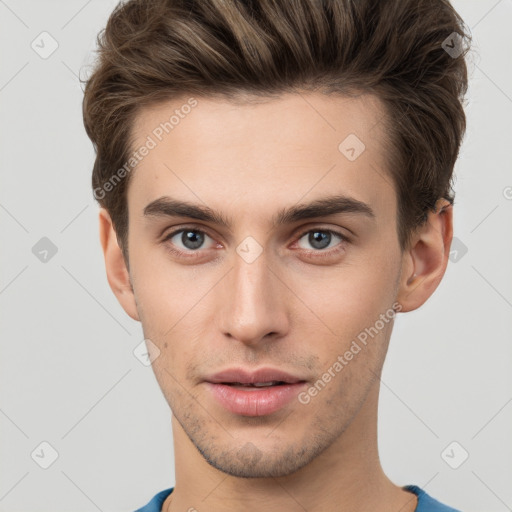 Neutral white young-adult male with short  brown hair and brown eyes