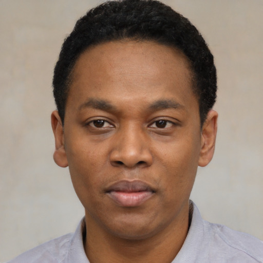 Neutral black young-adult male with short  black hair and brown eyes