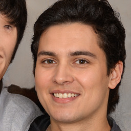 Joyful white young-adult male with medium  brown hair and brown eyes