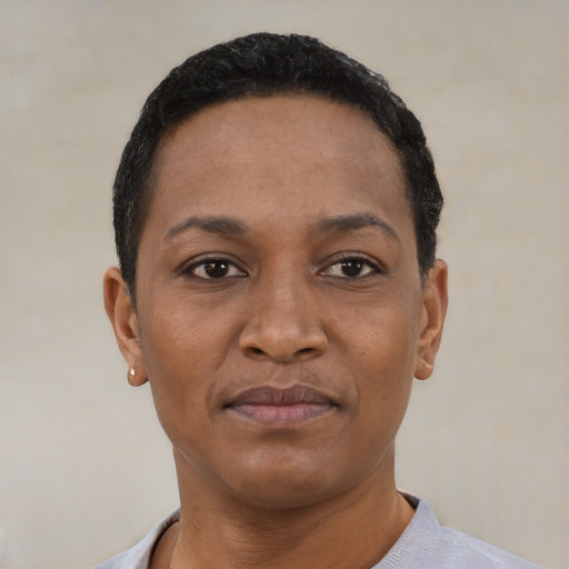 Neutral black young-adult female with short  black hair and brown eyes