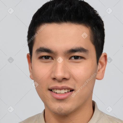 Joyful asian young-adult male with short  black hair and brown eyes