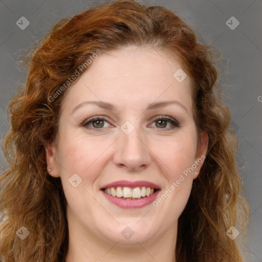 Joyful white young-adult female with long  brown hair and green eyes