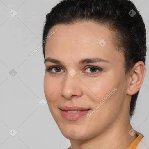 Joyful white young-adult female with short  brown hair and brown eyes