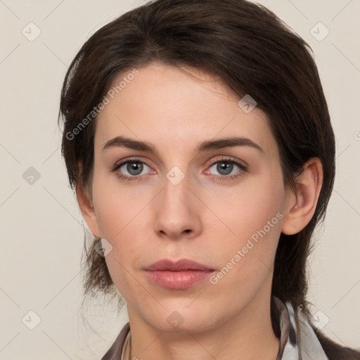 Neutral white young-adult female with medium  brown hair and brown eyes