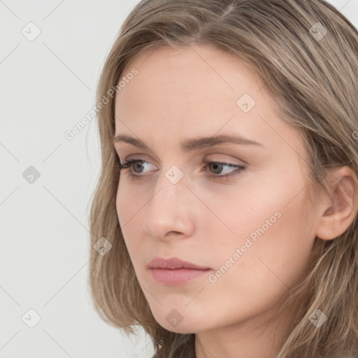 Neutral white young-adult female with long  brown hair and grey eyes