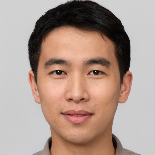Neutral asian young-adult male with short  black hair and brown eyes