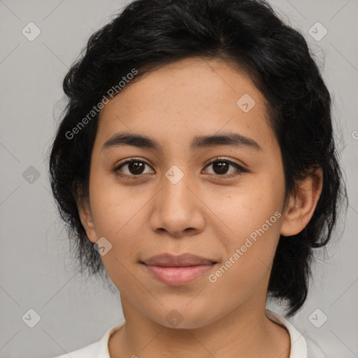 Joyful asian young-adult female with medium  black hair and brown eyes