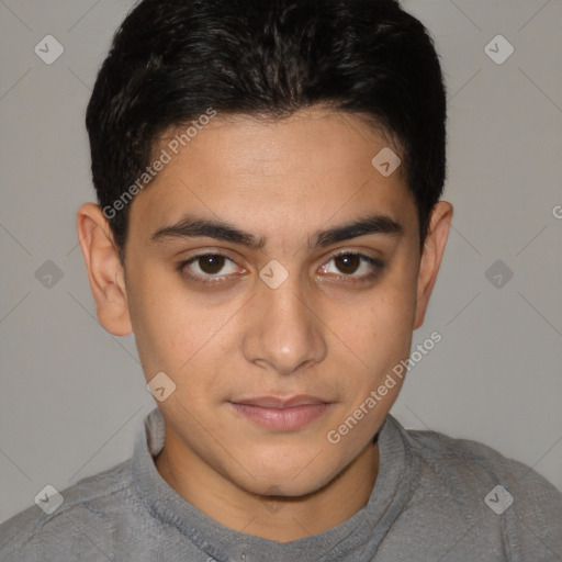 Joyful latino young-adult male with short  brown hair and brown eyes