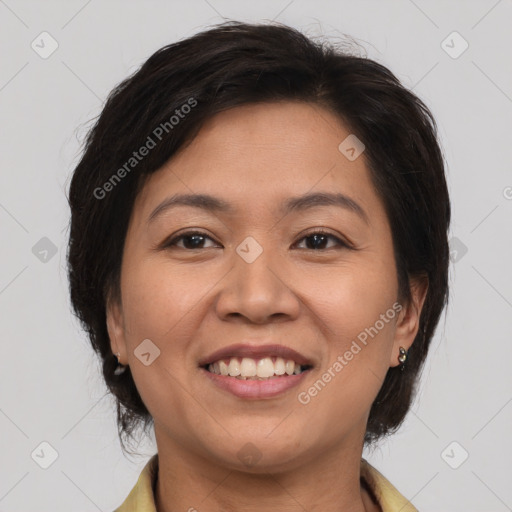 Joyful white adult female with medium  brown hair and brown eyes