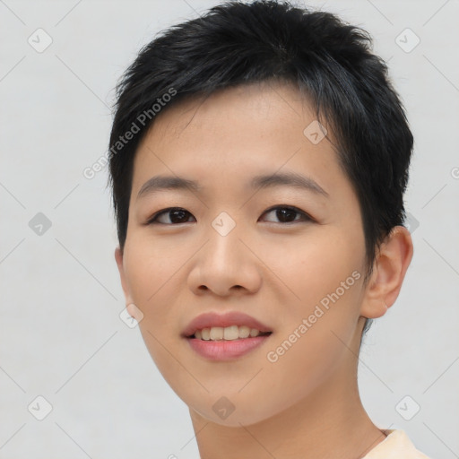 Joyful asian young-adult female with short  black hair and brown eyes