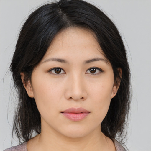 Neutral asian young-adult female with medium  black hair and brown eyes