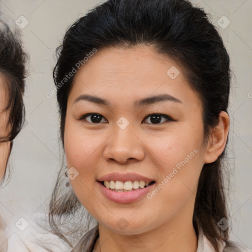 Joyful white young-adult female with medium  brown hair and brown eyes