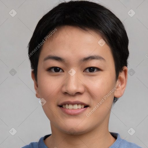 Joyful asian young-adult female with short  black hair and brown eyes