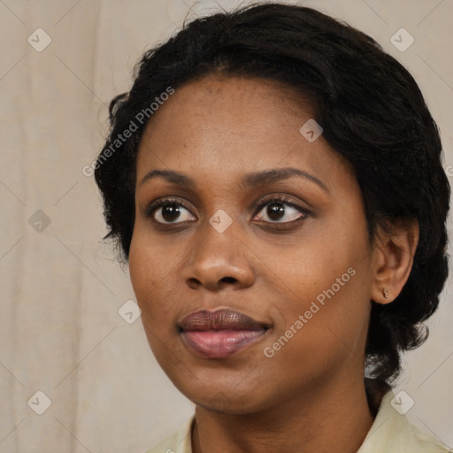 Joyful black young-adult female with medium  black hair and brown eyes