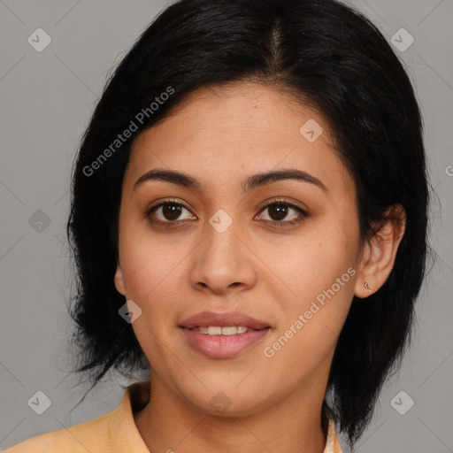 Joyful latino young-adult female with medium  black hair and brown eyes