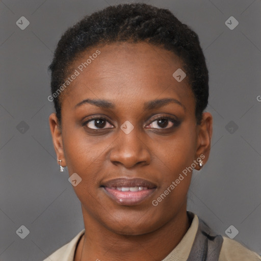 Joyful black young-adult female with short  brown hair and brown eyes