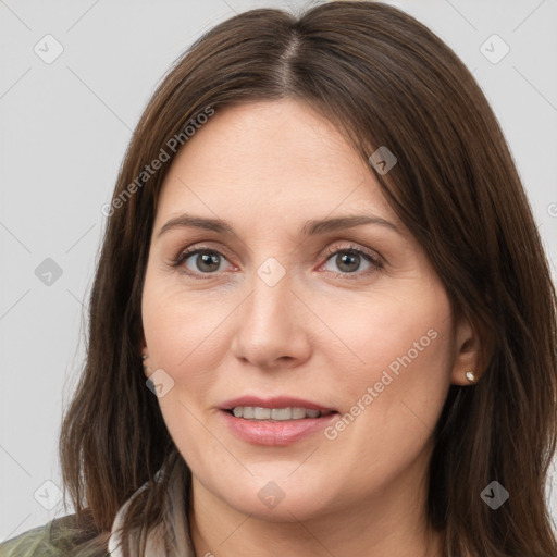 Joyful white young-adult female with medium  brown hair and grey eyes