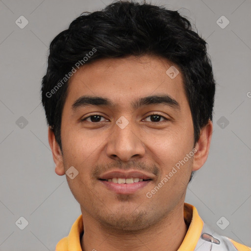 Joyful white young-adult male with short  black hair and brown eyes