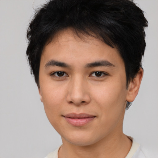 Joyful asian young-adult female with short  brown hair and brown eyes