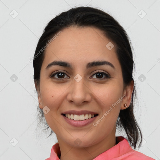 Joyful white young-adult female with medium  brown hair and brown eyes