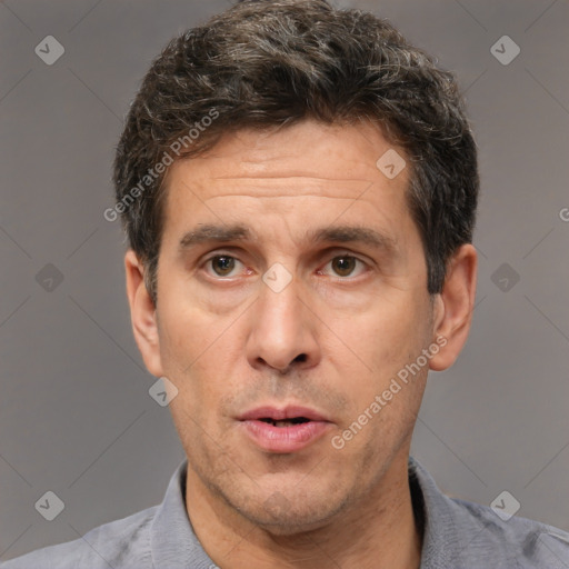 Neutral white adult male with short  brown hair and brown eyes