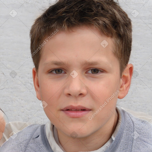 Joyful white child male with short  brown hair and brown eyes