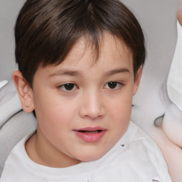 Joyful white child female with short  brown hair and brown eyes