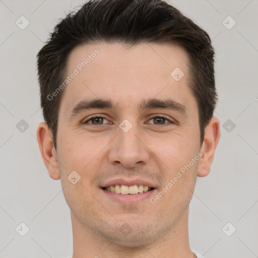 Joyful white young-adult male with short  brown hair and brown eyes