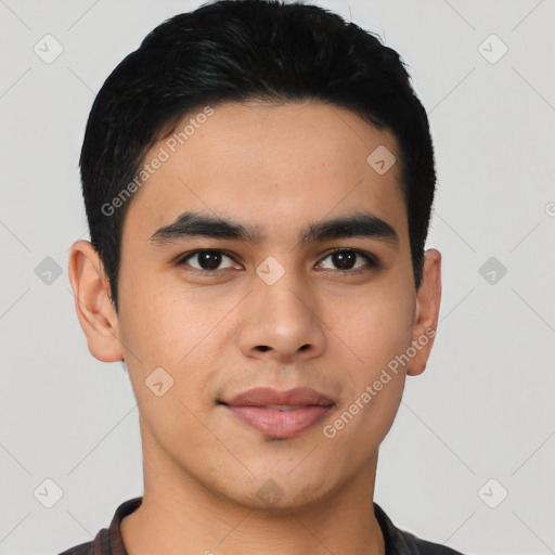 Joyful asian young-adult male with short  black hair and brown eyes