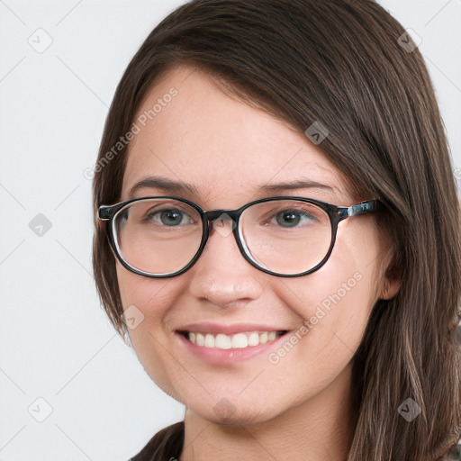 Joyful white young-adult female with long  brown hair and blue eyes