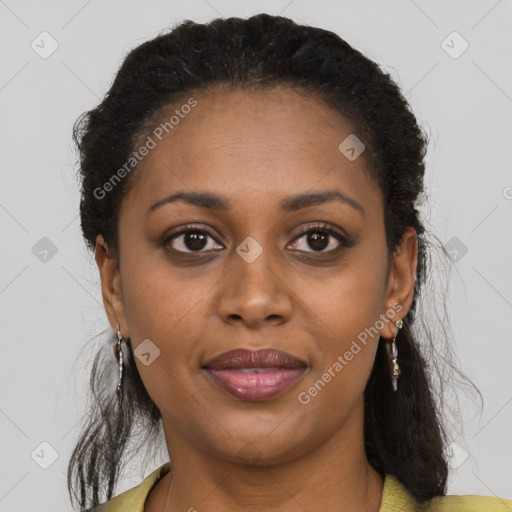 Joyful black young-adult female with medium  brown hair and brown eyes