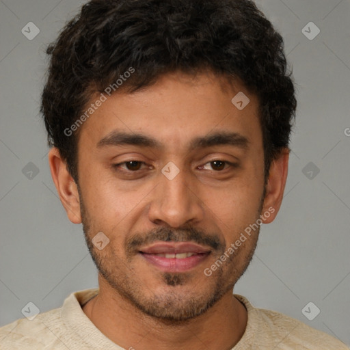 Joyful latino young-adult male with short  brown hair and brown eyes