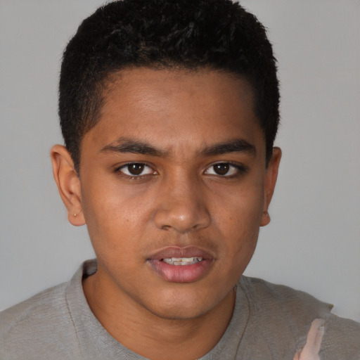 Joyful latino young-adult male with short  brown hair and brown eyes