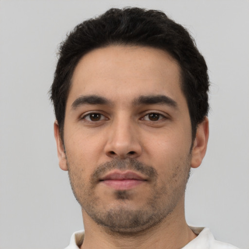Neutral white young-adult male with short  black hair and brown eyes