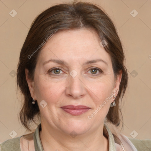 Joyful white adult female with medium  brown hair and grey eyes