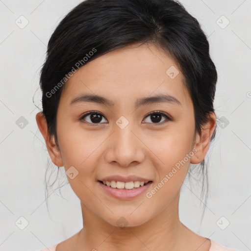 Joyful asian young-adult female with medium  black hair and brown eyes