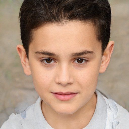 Joyful white child male with short  brown hair and brown eyes