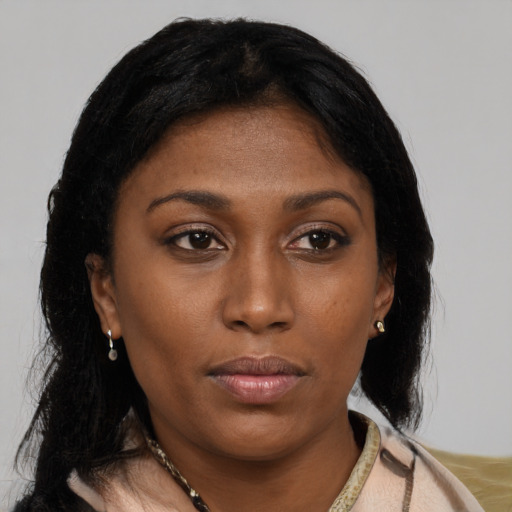 Neutral latino young-adult female with medium  black hair and brown eyes