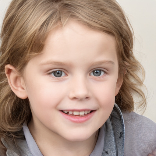 Joyful white child female with medium  brown hair and grey eyes