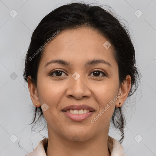 Joyful latino young-adult female with medium  brown hair and brown eyes