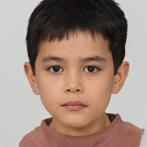 Neutral asian child male with short  brown hair and brown eyes