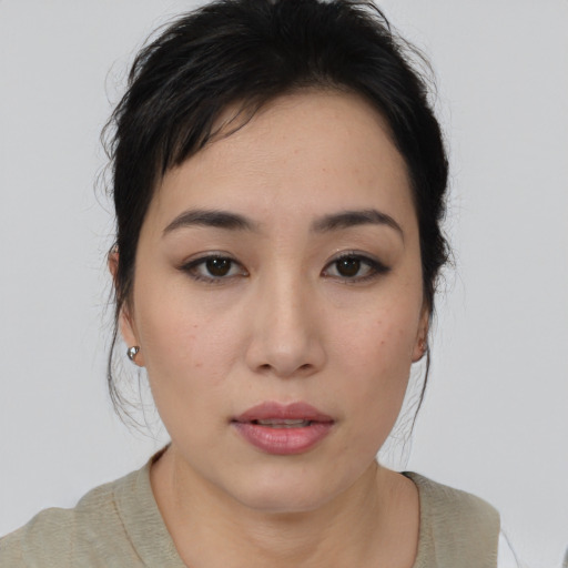 Neutral latino young-adult female with medium  brown hair and brown eyes