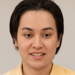 Joyful white young-adult female with medium  brown hair and brown eyes