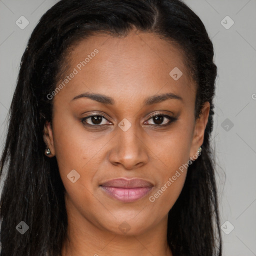 Joyful black young-adult female with long  brown hair and brown eyes